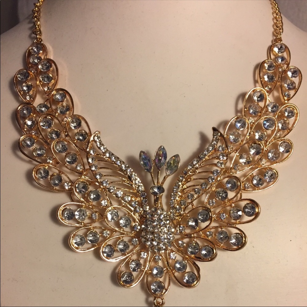 Huge ornate gold and rhinestone peacock necklace